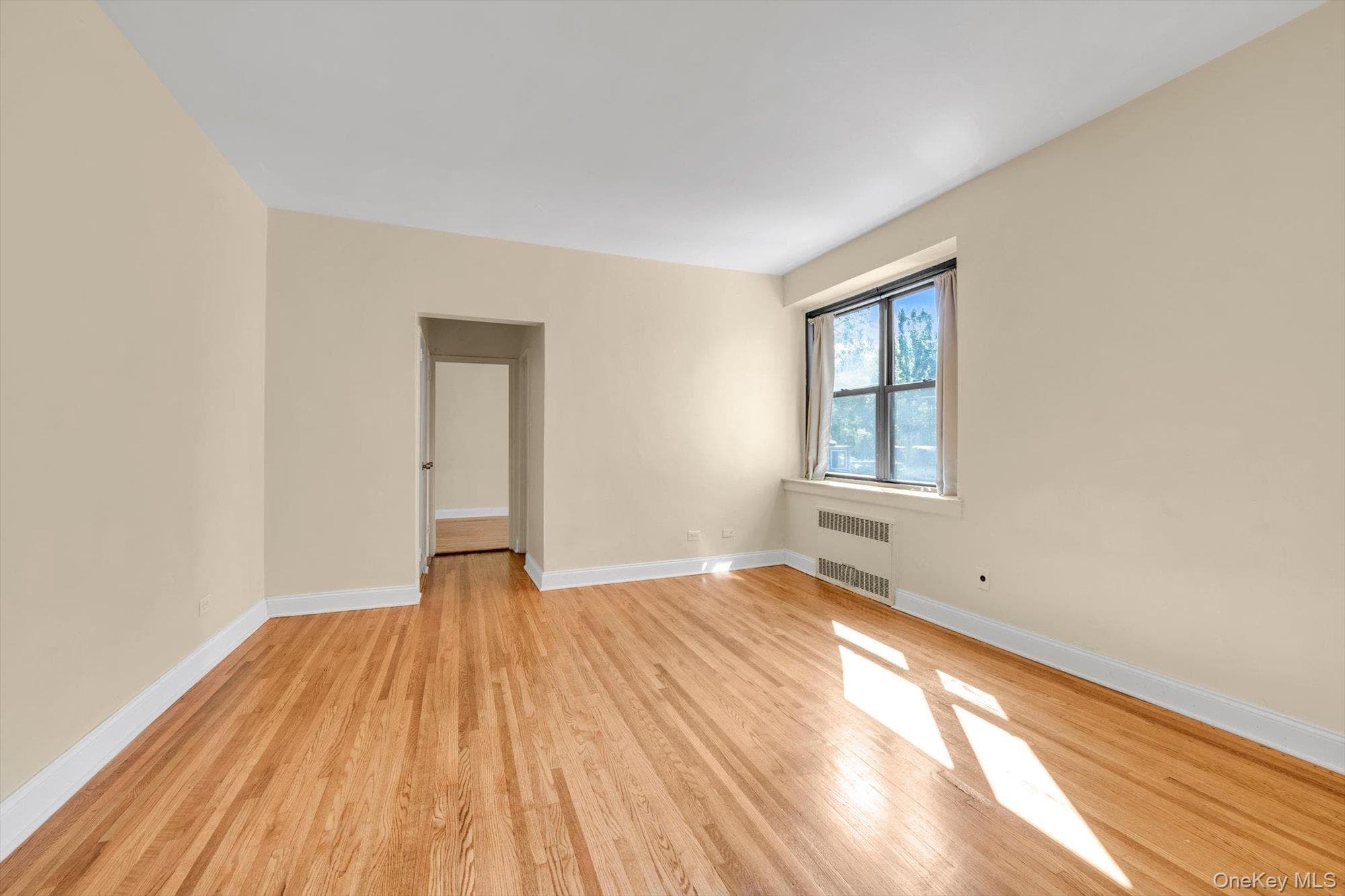112-25 34 Avenue Unit: H thumbnail 2
